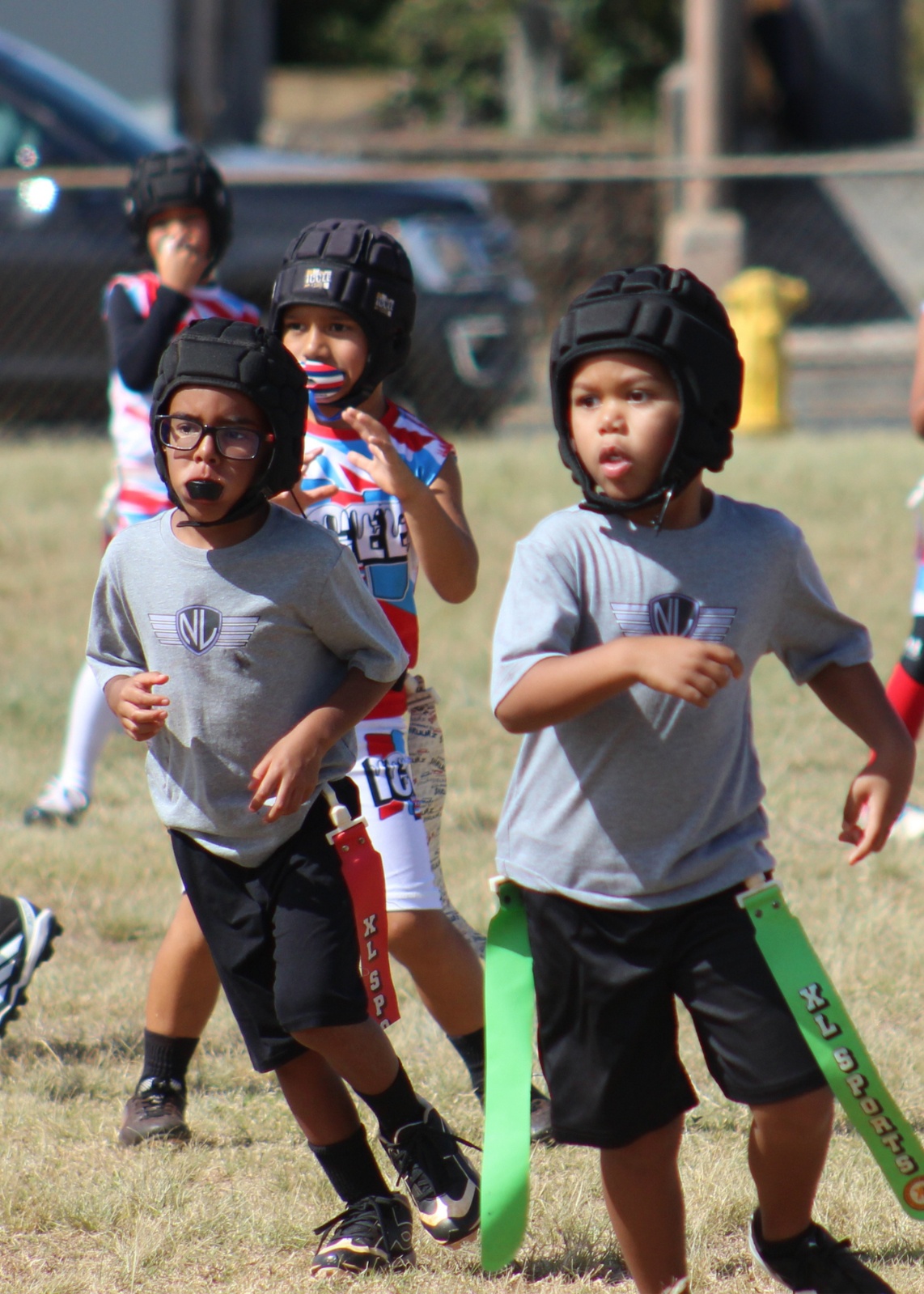 Pearl City Junior Chargers flag football players on the field