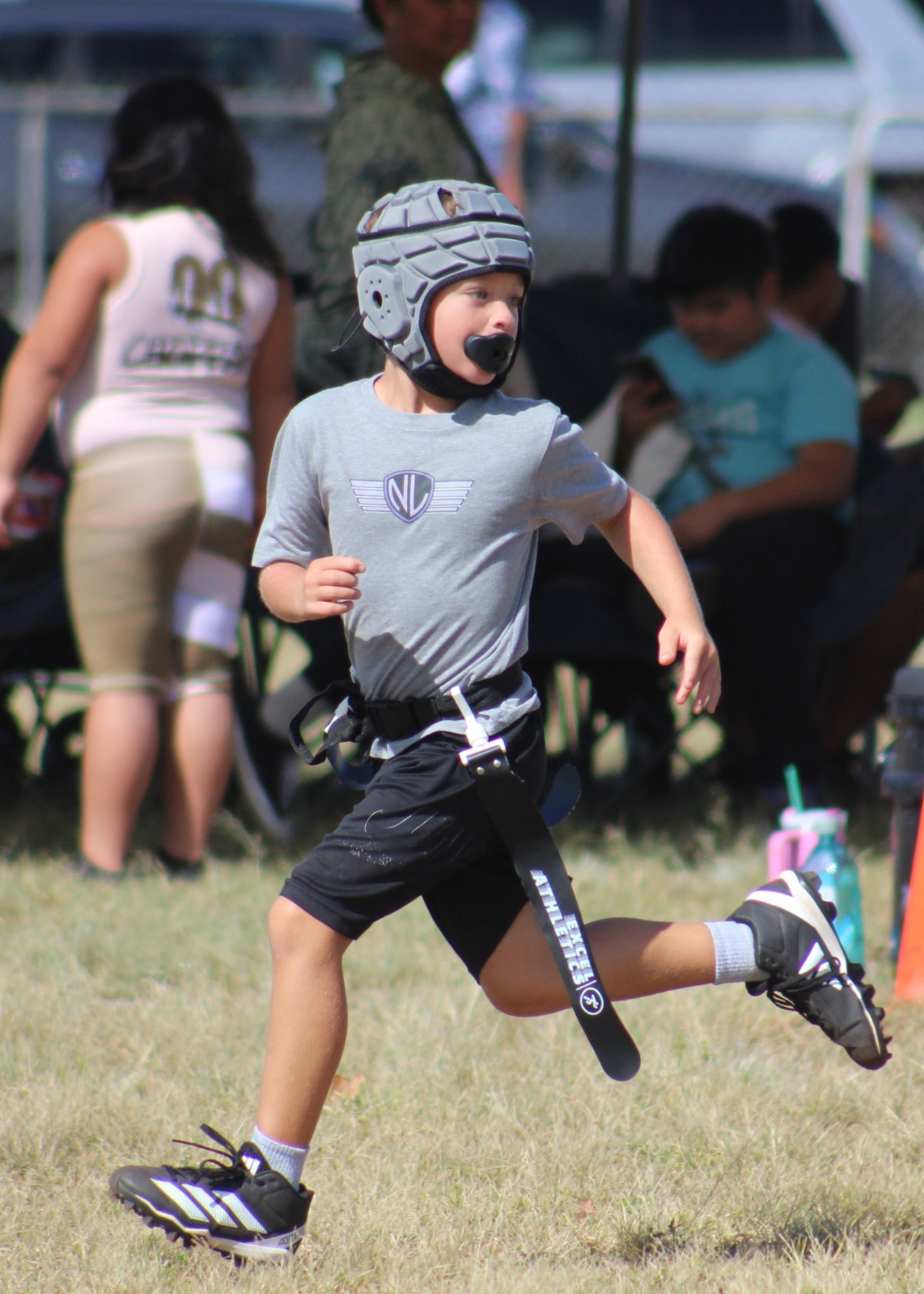Pearl City Junior Chargers flag football player in action