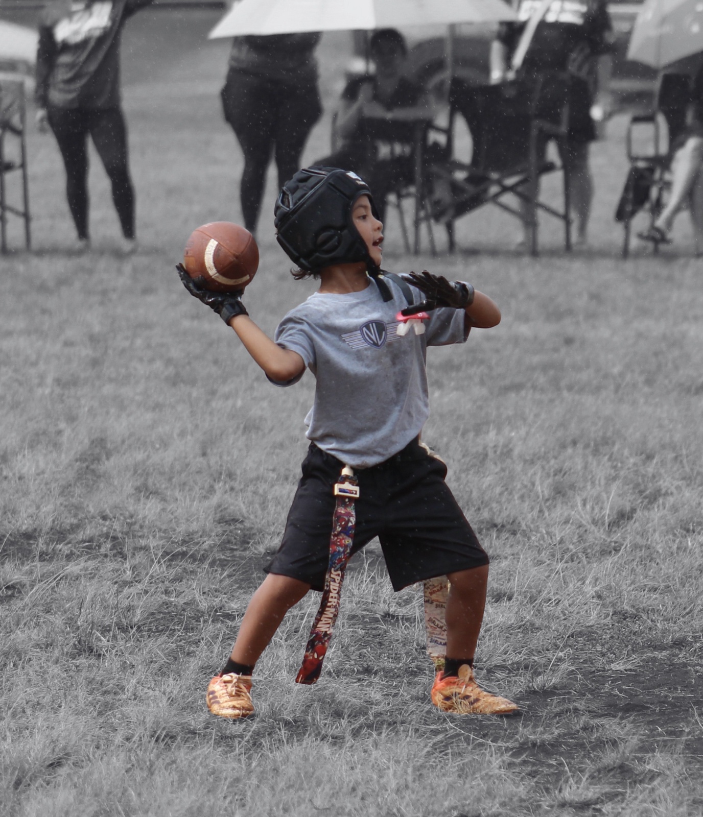 Pearl City Junior Chargers quarterback preparing to throw